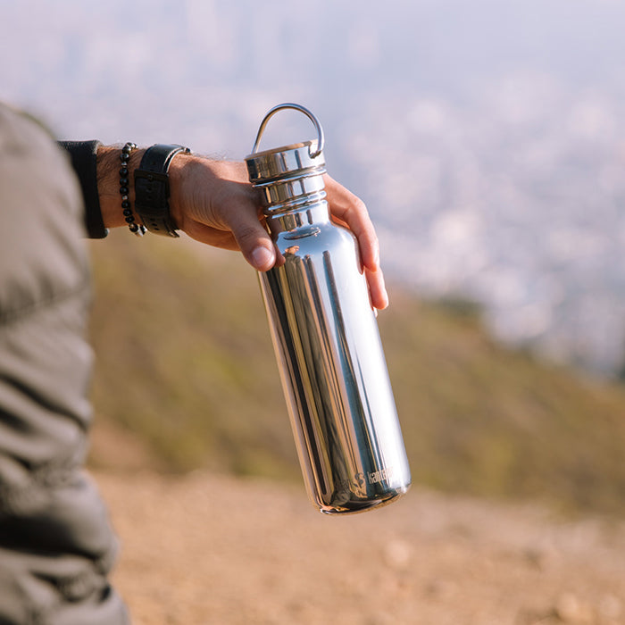 27oz-reflect-with-bamboo-cap-d5 K27SSLRF-MS-BAMBOO_reflect_bottle_hand_lifestyle.jpg