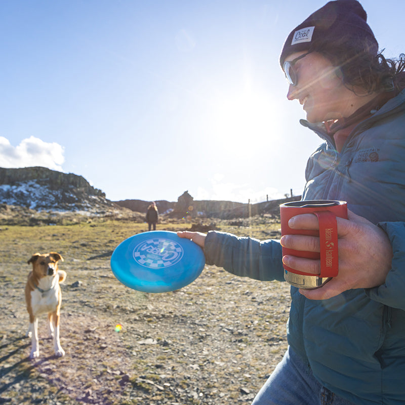 12oz-camp-mug-o0 insulated_camp_mug_12oz_woman_dog_frisbee_square.jpg