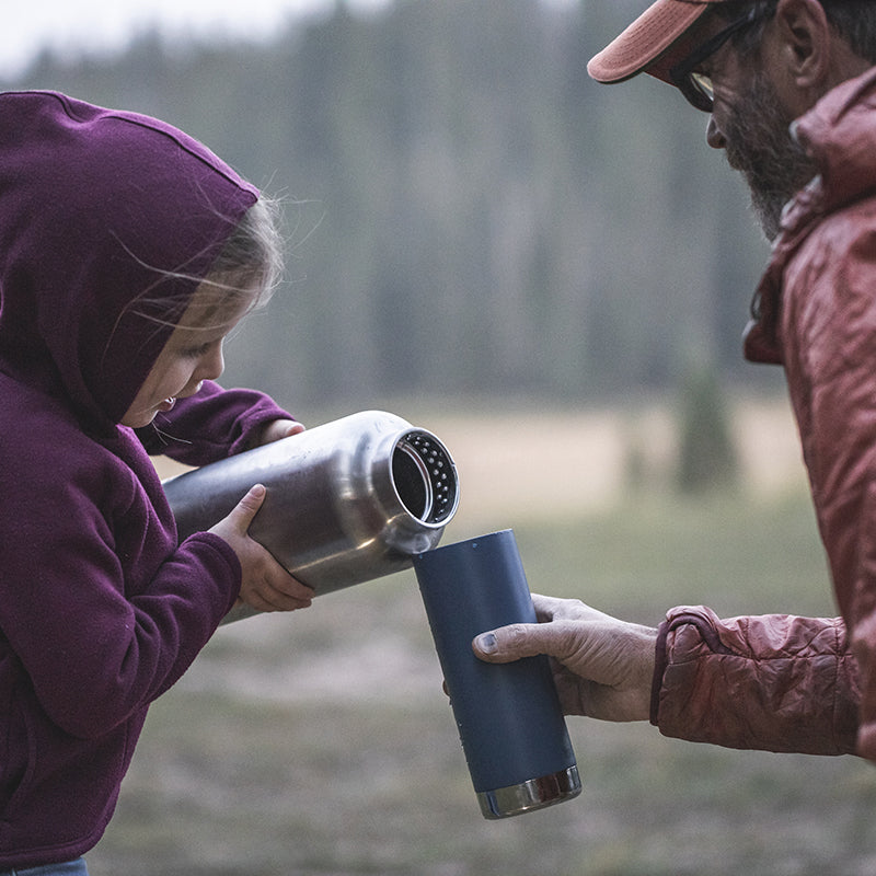 64oz-tkwide-with-loop-cap-n8 tkwide_64oz_bottle_girl_dad_filling_square.jpg